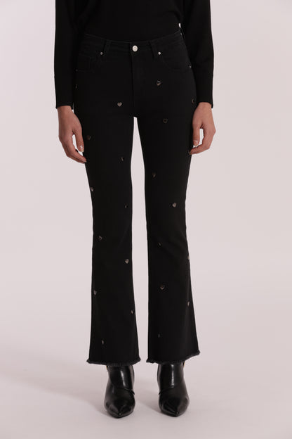JEANS FLARE CON BORCHIE CUORE