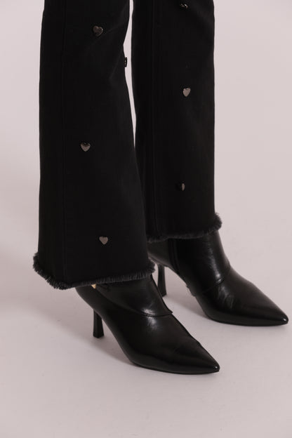 JEANS FLARE CON BORCHIE CUORE