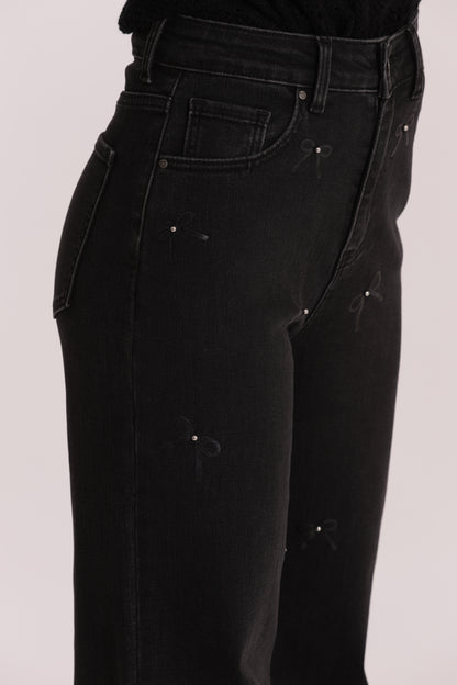 JEANS WIDE LEG CON STAMPA FIOCCO