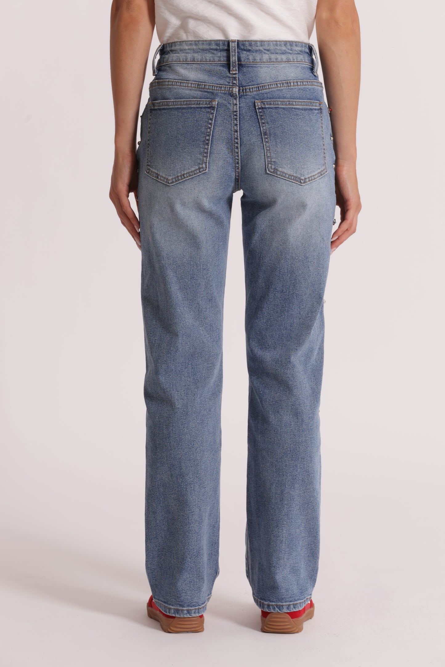 JEANS SIGARETTA CON BORCHIE LATERALI