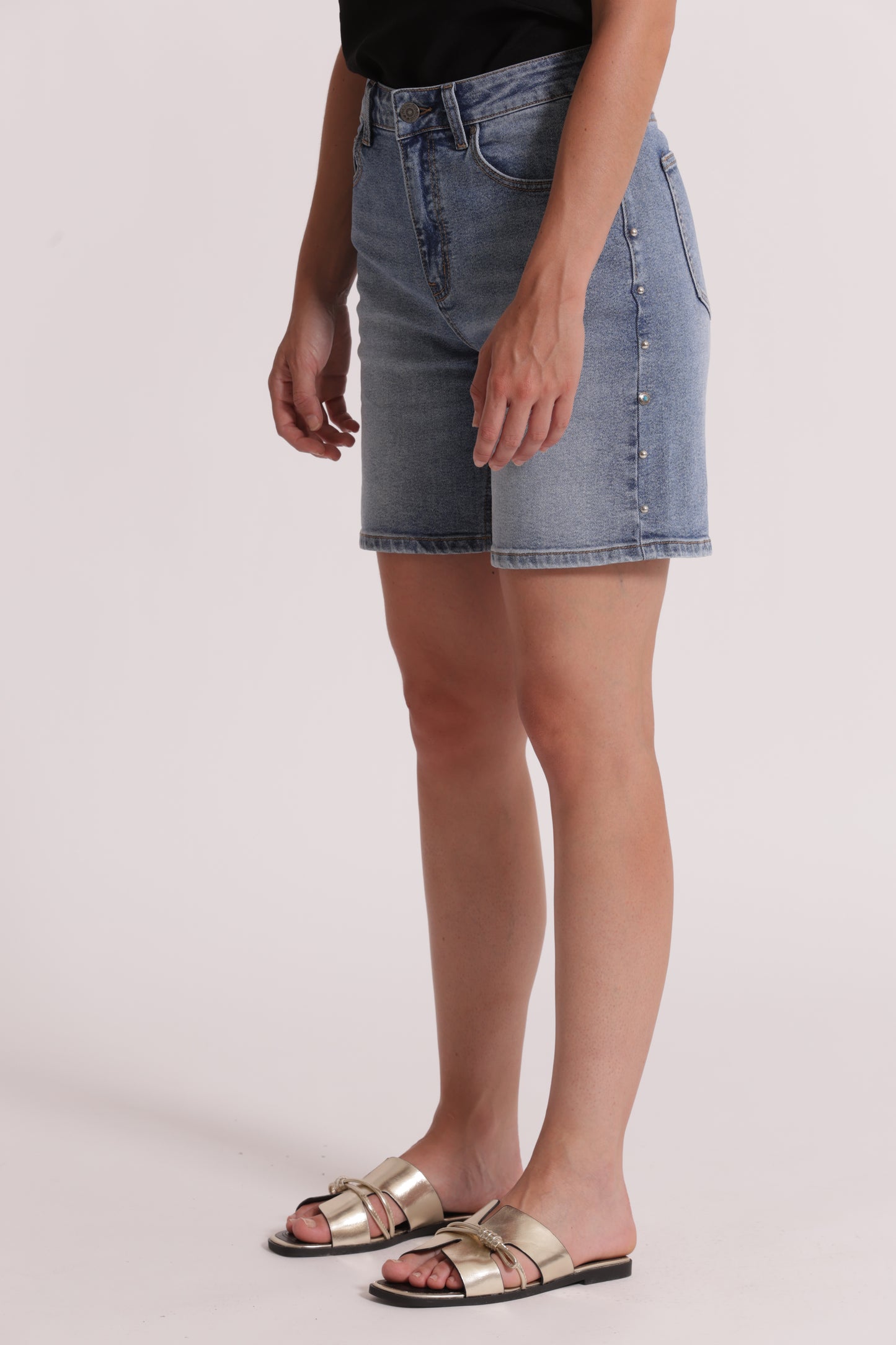 BERMUDA IN DENIM CON BORCHIE LATERALI