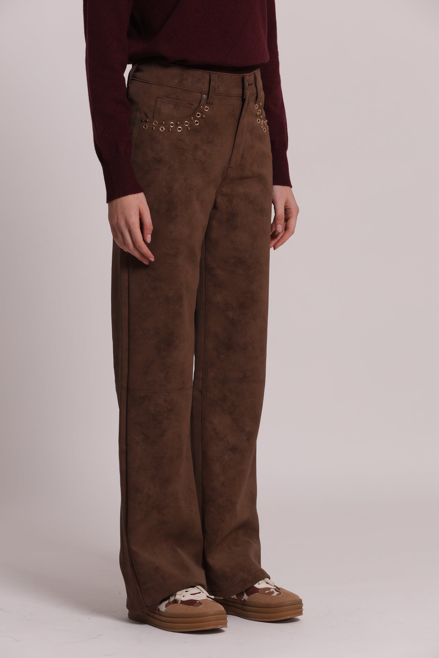PANTALONE IN TESSUTO SPALMATO CON BORCHIE